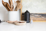 Frankincense diffuser oil next to Helse diffuser